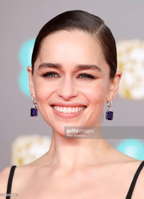 LONDON, ENGLAND - FEBRUARY 02: Emilia Clarke, earring detail, attends the EE British Academy Film Aw