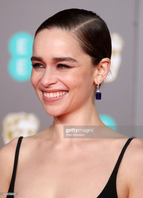 LONDON, ENGLAND - FEBRUARY 02: Emilia Clarke, earring detail, attends the EE British Academy Film Aw