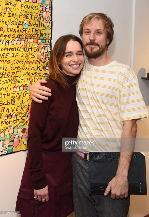 LONDON, ENGLAND - FEBRUARY 08:  Emilia Clarke and Ollie Gommie attend the Gommie exhibition at Messu