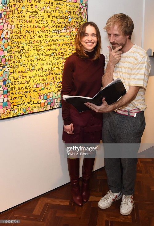 LONDON, ENGLAND - FEBRUARY 08:  Emilia Clarke and Ollie Gommie attend the Gommie exhibition at Messu